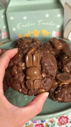 Thick chocolate cookies topped with white Kit Kat bunnies, crispy and chewy, perfect for Easter treats.