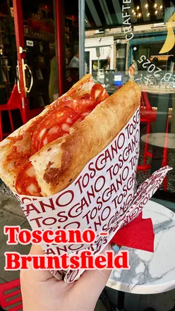 Delicious Schiacciata bread served with fresh ingredients, perfect for sharing and enjoying with friends.