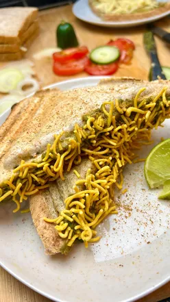 Delicious homemade Bombay sandwich with spicy green chutney and fresh vegetables, perfect for foodies.
