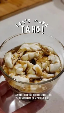 Delicious brown sugar taho dessert with silken tofu and sago pearls, a beloved Filipino treat.