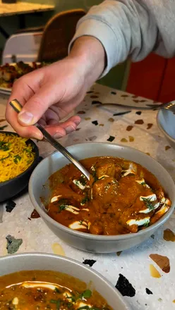 Spicy margarita and a feast of Indian dishes at Singh Street Cafe, including tandoori chicken and haji bhaji.