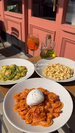 Delicious handmade pasta dishes at Pasta Evangelists in Chiswick, showcasing Italian flavors and generous servings.