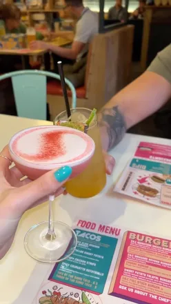 Delicious full stack burger, crispy fries, and cocktails at Chance and Counters board game cafรฉ in Bristol.