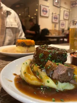 Easter weekend feast featuring delicious dishes from Makars Mash Bar in Glasgow, with mini eggs and tulips.