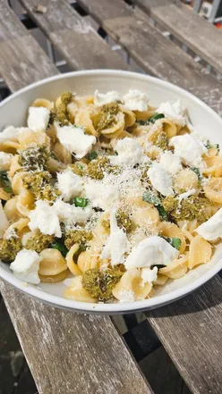 Lemon pesto mozzarella pasta with orecchiette, fresh basil, and parmesan, perfect for sunny days.
