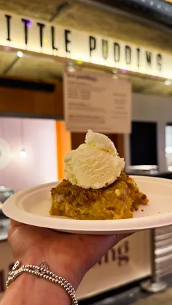 Indulgent Biscoff & White Chocolate Doughnut Pudding, soft and creamy dessert from Little Pudding London.