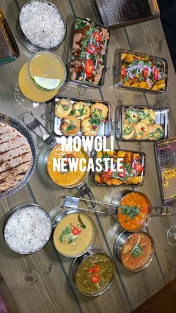 Delicious Indian street food served at a new cafe in Newcastle, showcasing vibrant dishes and flavors.