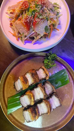 Delicious Chinese dishes at J7 Restaurant in Vauxhall, featuring crispy pork belly and satay beef ribs.