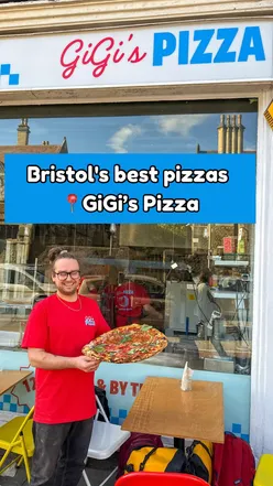 Delicious pepperoni pizza with charred edges at Gigi's Pizza Shop in Bristol, showcasing fresh ingredients and passion.