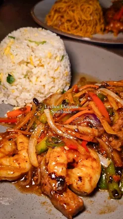 Delicious Asian dishes at Lychee Glasgow: crispy duck rolls, sesame prawn toast, and beef with prawns in black bean sauce.