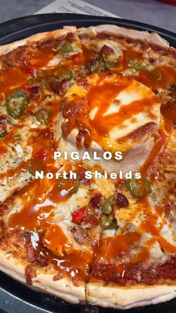 Delicious deep dish volcano pizza from Pigalos in North Shields, perfect for foodies and pizza lovers.