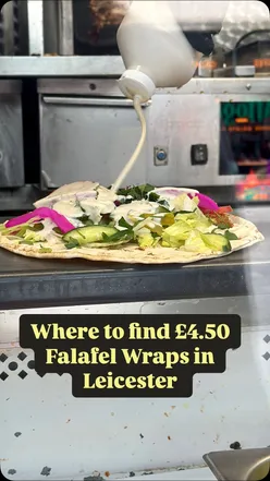 Delicious falafel and hummus wrap with salad and sauce from Falafel Land in Leicester City Centre.