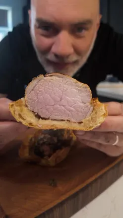 Perfectly cooked pork tenderloin in bread, showcasing cooking tips with Meatermade Pro Duo for juicy results.