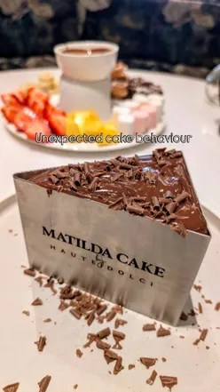 A delicious Matilda chocolate cake topped with rich frosting, perfect for dessert lovers in London.