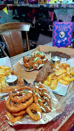 Delicious vegan fish and chips with cauliflower wings and garlic aioli at The Happy Fish, Edinburgh.