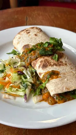 Delicious roti wraps with chana masala and aloo at 10 to 10 cafe in Edinburgh, perfect for a budget-friendly lunch.