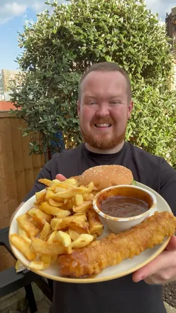 Delicious chicken burger with lettuce and mayo, jumbo battered sausage, chips, and gravy from Thornbury Fish Bar.
