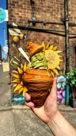 Double-baked pistachio and almond croissant at The Flat Baker's Pistachio Festival in Ancoats.