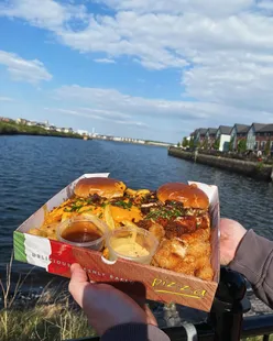 Grill Next Door Barry munch box with divine burgers, crispy patties, and flavorful hot honey chicken tenders, priced at £35.