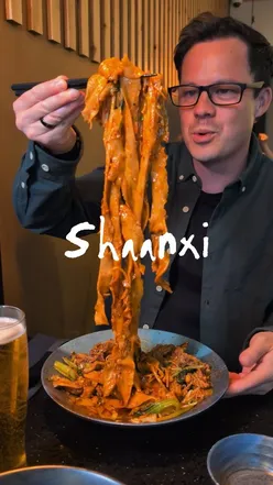 Shaanxi's hand-pulled noodles with tender beef short rib, pork belly burger, and dumplings at Brighton's Preston Street noodle bar.