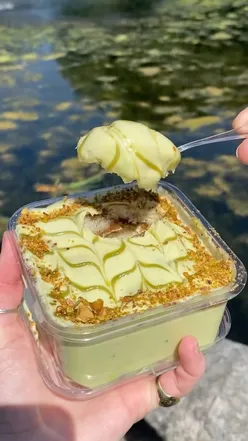 Tiramisu from a window near Hyde Park's Italian Gardens, evoking Florence vibes, perfect for a sunny weekend treat.