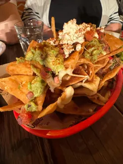 Mexican feast at El Diablo on Gloucester Road, featuring nachos, margaritas, chicken tinga, and beef brisket tacos.