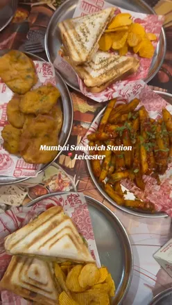 Mumbai Sandwich Station in Leicester: Pizza Toastie, Saucy Mumbai relish chips, Crispy Bhajiya, Bollywood-inspired decor.