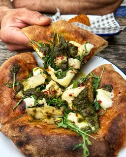 Italian dishes at Northtown Kitchen in Sheffield, featuring pizza breads, arancini, cannoli, and coffee on Abbeydale Road.