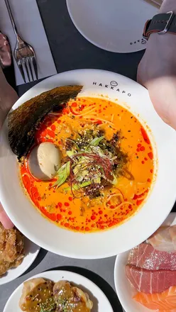Tan tan ramen with creamy sesame broth and ajitama egg at Hakkapo near Deansgate, Manchester; Japanese cuisine delight.