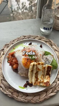 Brunch at Foda Wbay: fried egg, kimchi, avocado on sourdough with halloumi, granola bowl, stunning interior, chill vibe in Newcastle.