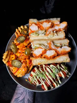 BONEHEAD X JAKE’S FOOD BIBLE collab featuring Buffalo Sando, Dragon Wings, and Cinema Fries for Father's Day treat.