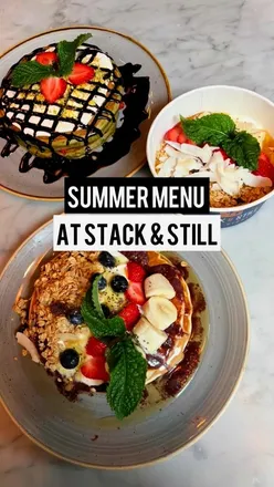 Stack & Still summer menu with iced matcha latte, Matcha Stack pancakes with strawberries, Aรงai Stack with acai sorbet, and Yoghurt Bowl with granola.