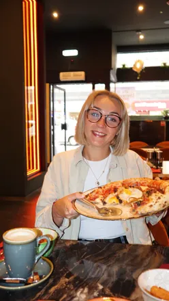Breakfast pizza with beans and hash brown, pulled chicken sandwich, and shared chips at Fired Dough Pizzas, Edinburgh.