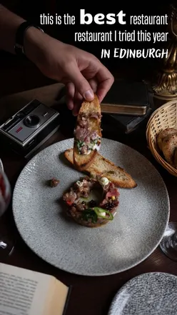 Hidden Le Bistrot on Royal Mile, Edinburgh; French cuisine with tartare, octopus, scallops, duck, and budget-friendly tips.