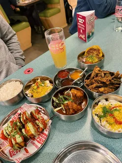 Indian street food at Bundobust in Leeds: Bundo Chaat, Okra Fries, Paneer Tikka, Raghda Pethis with spiced peas, Tarkha Dhal & Rice.