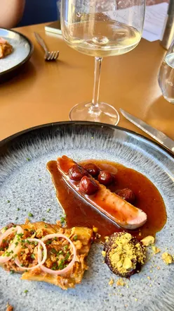 Five-course fine dining in Edinburgh: Octopus hotdog, Thai tartare, Cajun prawns, smoked duck, cereal milk parfait.