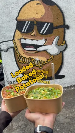 Loaded baked potatoes with chili butter, salt & chicken curry, and South Indian garlic chili chicken at Southside Spuddies, Glasgow.