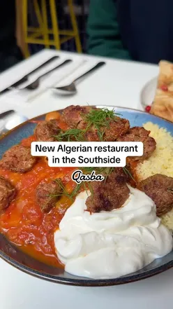 Cozy Algerian restaurant Qasba in Govanhill, Glasgow, serving halal North African and Middle Eastern cuisine, including tagines.