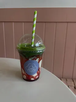 Iced strawberry matcha at Cafe Granny's, perfectly balanced sweetness, with a cozy cafe vibe.