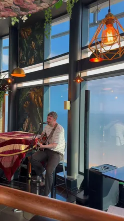 Dine at Altitude atop Wales' tallest building in Swansea, offering stunning views, warm service, and delightful cocktails.