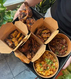 Barabicu London takeaway feast with BBQ grill boxes, bodega sandwiches, and Korean BBQ corn ribs at Beer Rebellion Peckham.
