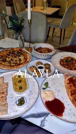 Halal Italian restaurant Alayla Lounge in Birmingham with authentic dishes, free parking, and a prayer room.