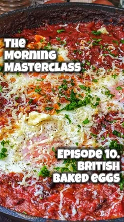 British baked eggs with sausages, bacon, black pudding, tomatoes, and cheddar, perfect for a cozy Sunday breakfast.