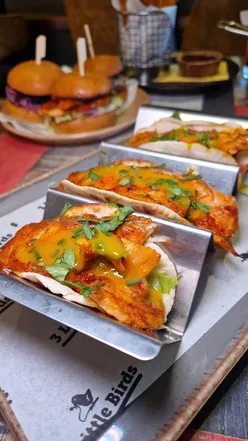 Halal Caribbean cuisine at 3 Little Birds Leicester: Maria Maria, Rum Punch, spiced salmon tacos, mixed sliders, okra chips, banana loaf.
