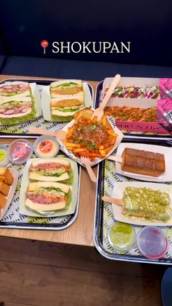 Shokupan's new menu at Grand Central features Shawarma Chicken and Green Chilli Cheese Beef Slim Pizzas, Smashed Samosa Deli Sando, and Spicy Chickpeas Fries.