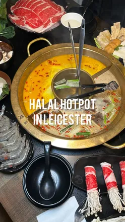 Halal hotpot at Hot7 Hotpot Leicester with double broth, prawn mash, fish balls, beancurd rolls, beef, and mushroom platter.