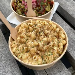 Gourmet Mac and Cheese at Cardiff Bay festival: Garden Mac with pesto, sun-dried tomatoes, pickled onions, and Posh Mac with truffle.