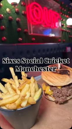 Sixes Social Cricket in Manchester offers competitive cricket games, delicious burgers, fries, and cocktails in a lively setting.