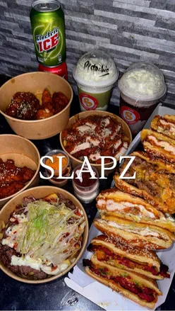 Halal food at Slapzburger in Birmingham: SLAPZBox with burger, tenders, loaded fries; Okie Smash, Red donner sizzla, Garlic Buttermilk Crispy burgers; Smashed Donner Fries, Truffle Mushroom Chicken Fries; Flaming, Korean BBQ, Katsu Kurry tenders; Pistachio, Jammy O milkshakes.