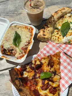 Italian feast at Mariagianna Ouseburn with ricotta garlic pizza, lasagne, tiramisu, and iced latte in Newcastle.
